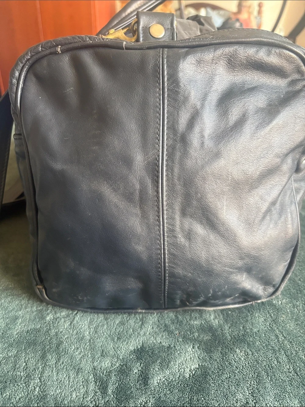 Classic Black Leather Duffel with Adjustable Shoulder Strap